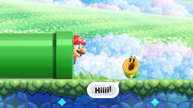 Ein Super Mario Bros. Wonder-Screenshot zeigt Mario, wie er aus einem grünen Rohr späht. 